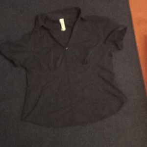 Black shirt, with grommets in the back.